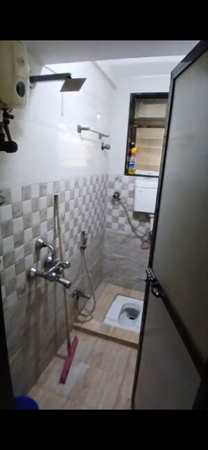 Bathroom in 2 BHK Apartment at Shree Krishna CHS, Kurla West – for Rent