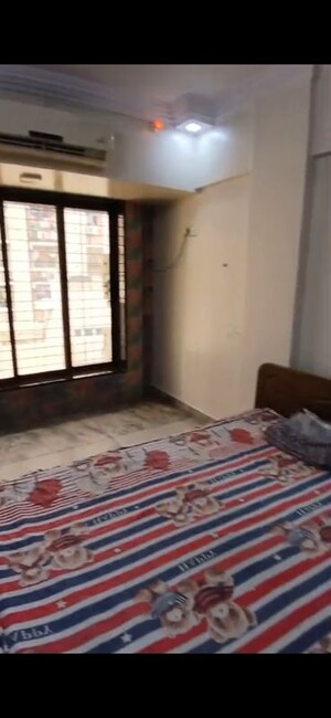Bedroom in 2 BHK Apartment at Shree Krishna CHS, Kurla West – for Rent