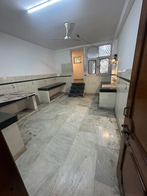 Kitchen in 4 BHK Builder Floor at Pamposh Enclave – for Sale