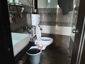 Bathroom in 1 BHK Apartment at Agarwal Paramount, Virar West – for Rent