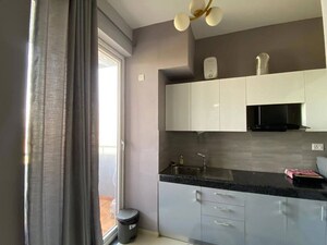 Kitchen in 2 BHK Apartment at Supertech Hues, Sector 68 – for Rent