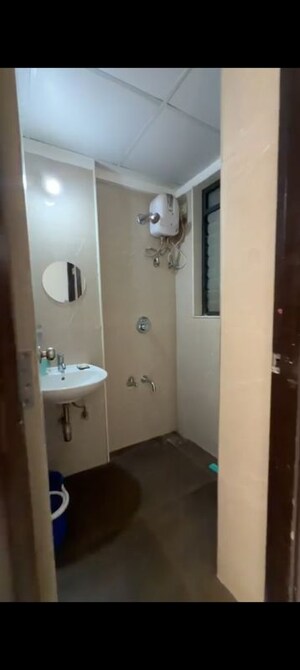 Bathroom in 1 BHK Apartment at Lodha Palava Downtown, Dombivli East – for Rent