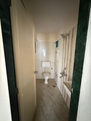 Bathroom in 1 BHK Apartment at Samarth Enclave, Andheri East – for Rent