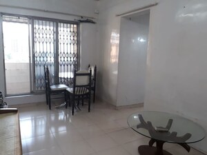 Living Room in 1 BHK Apartment at UK Iridium, Kandivali East – for Rent