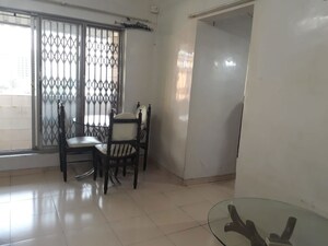 Living Room in 1 BHK Apartment at UK Iridium, Kandivali East – for Rent