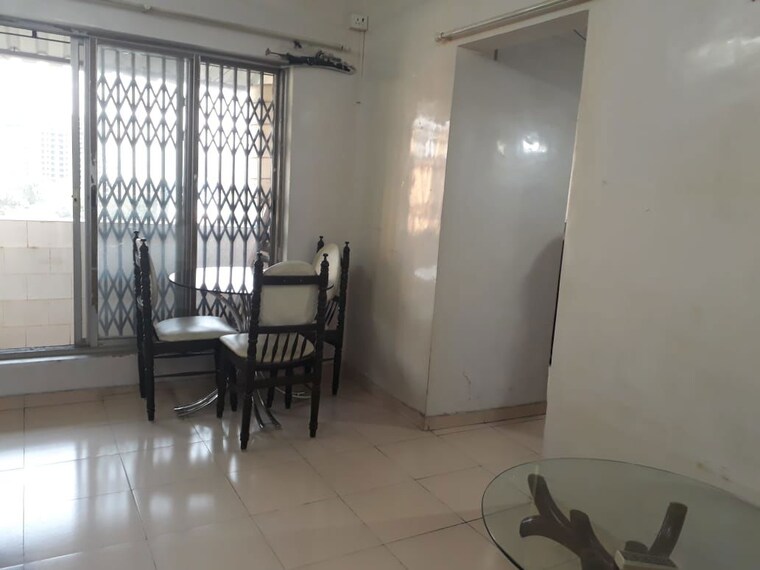 Living Room, uk-iridium 1 Bedroom 410 Sq.Ft. Apartment In Kandivali East Mumbai 10740953