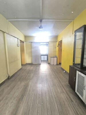 Living Room in 2 BHK Apartment at Kaustubh Usha Colony CHS, Malad West – for Rent