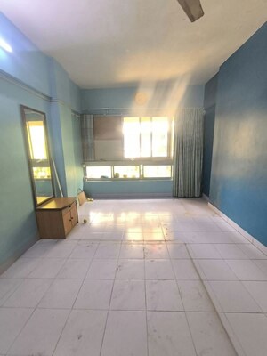 Bedroom in 2 BHK Apartment at Kaustubh Usha Colony CHS, Malad West – for Rent