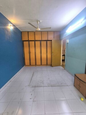 Bedroom in 2 BHK Apartment at Kaustubh Usha Colony CHS, Malad West – for Rent