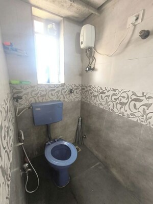 Bathroom in 2 BHK Apartment at Kaustubh Usha Colony CHS, Malad West – for Rent