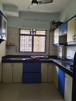 Kitchen in 2 BHK Apartment at Cosmos Paradise Complex, Thane West – for Rent