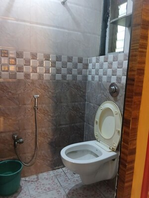 Bathroom in 1 BHK Apartment at Kalpataru Shravasti, Malad West – for Rent