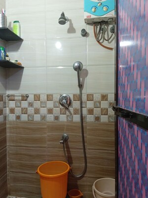 Bathroom in 1 BHK Apartment at Kalpataru Shravasti, Malad West – for Rent