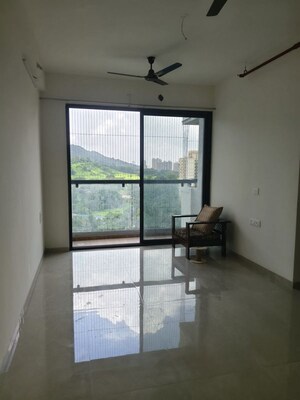 Living Room in 2 BHK Apartment at Dhamji Shamji Mahavir Spring Tulip Phase 1, Pokhran Road No Two – for Rent