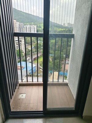 Balcony in 2 BHK Apartment at Dhamji Shamji Mahavir Spring Tulip Phase 1, Pokhran Road No Two – for Rent