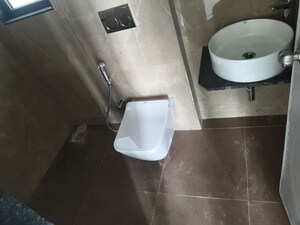 Bathroom in 2 BHK Apartment at Dhamji Shamji Mahavir Spring Tulip Phase 1, Pokhran Road No Two – for Rent