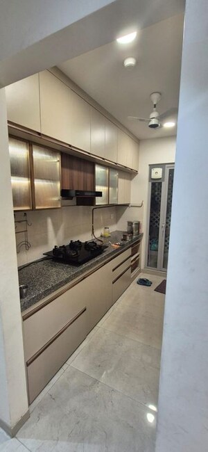 Kitchen in 3 BHK Apartment at Piramal Vaikunth, Balkum Pada – for Rent