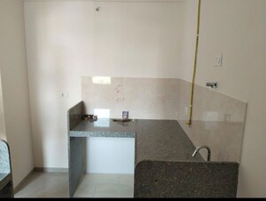 Kitchen in 2 BHK Apartment at Piramal Vaikunth, Balkum Pada – for Rent