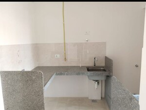 Kitchen in 2 BHK Apartment at Piramal Vaikunth, Balkum Pada – for Rent