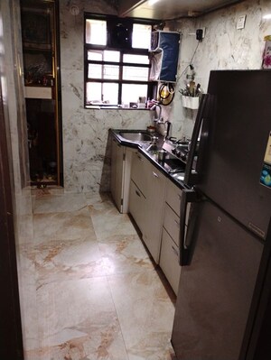 Kitchen in 2 BHK Apartment at Rutu Estate, Brahmand – for Sale