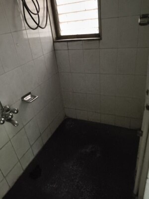 Bathroom in 1 BHK Apartment at Vedant Complex CHS, Samata Nagar – for Rent