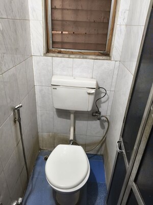 Bathroom in 1 BHK Apartment at Vedant Complex CHS, Samata Nagar – for Rent
