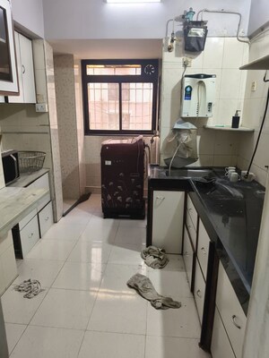 Kitchen in 2 BHK Apartment at Vedant Complex CHS, Samata Nagar – for Sale