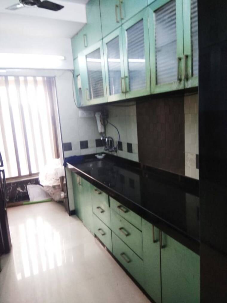 Kitchen, veera desai road 3 Bedroom 1200 Sq.Ft. Apartment In Veera Desai Road Mumbai 10741508