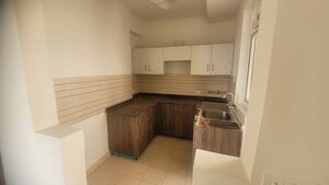 Kitchen in 3 BHK Apartment at Amrapali Silicon City, Sector 76 – for Sale