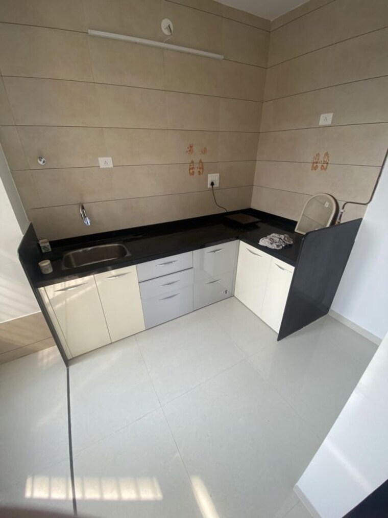 Kitchen, ahura-ecopolitan 2 Bedroom 637 Sq.Ft. Apartment In Punawale Pune 10741548