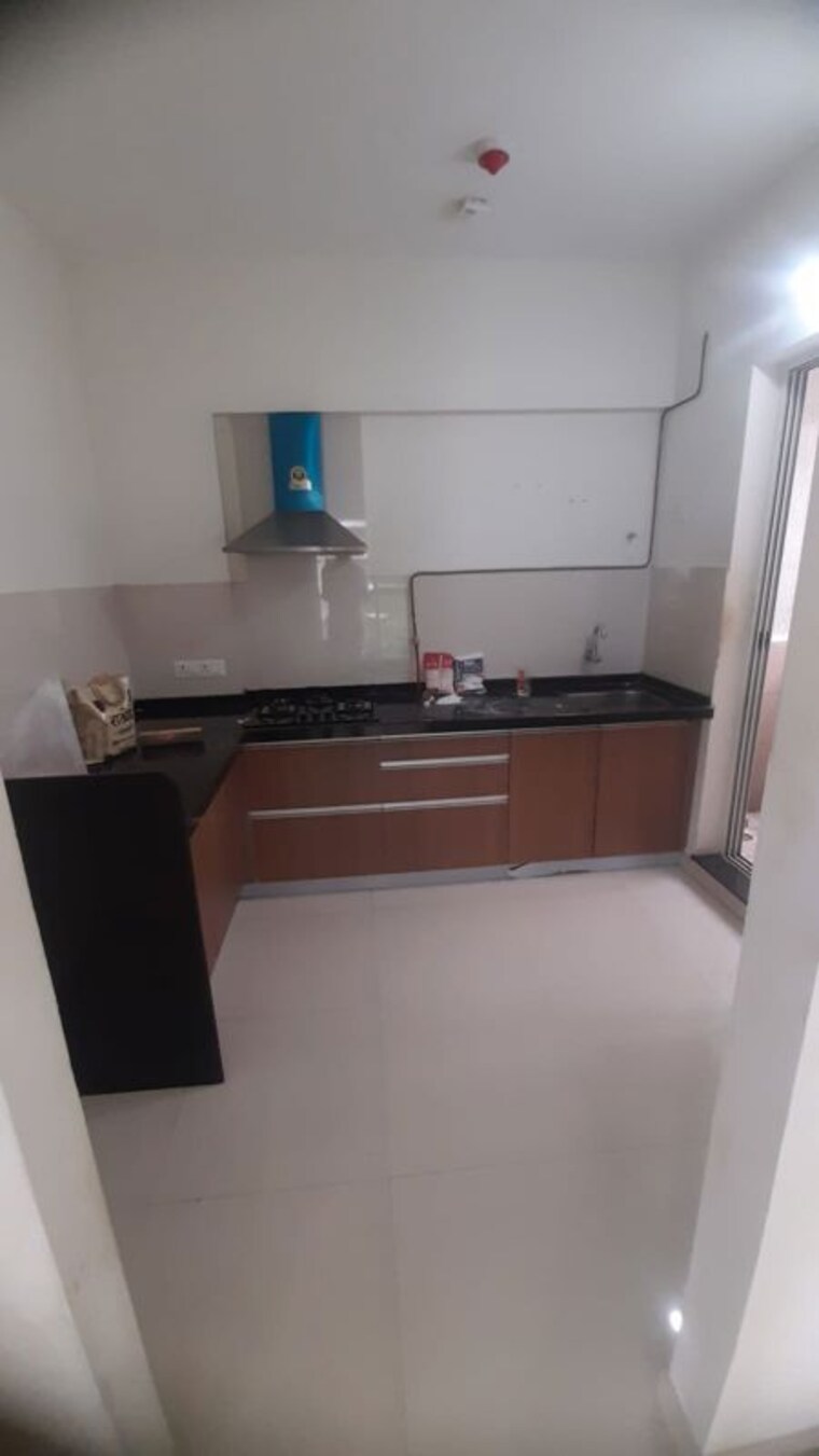 Kitchen, pride-purple-park-astra 2 Bedroom 690 Sq.Ft. Apartment In Hinjewadi Pune 10741596