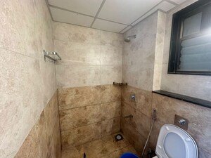 Bathroom in 2 BHK Apartment at Paranjape Blue Ridge, Hinjewadi – for Rent