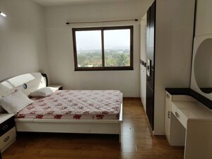 Bedroom in 2 BHK Apartment at Paranjape Blue Ridge, Hinjewadi – for Rent