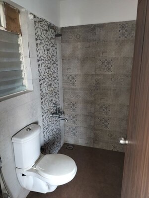 Bathroom in 2 BHK Apartment at Gulmohar Skypark, Dhanori – for Rent