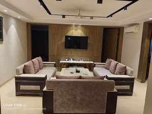 Living Room in 4 BHK Apartment at Sushant Lok I – for Rent