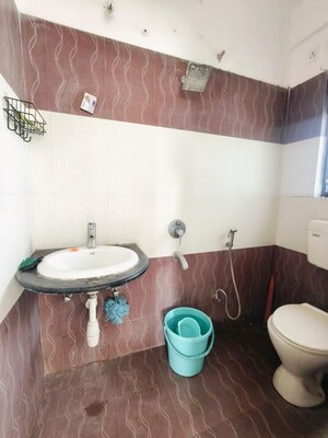 Bathroom in 2 BHK Apartment at Kolte Patil Margosa Heights, Mohammadwadi – for Rent