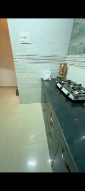 Kitchen in 1 BHK Apartment at Tanvi Eminence, Mira Road – for Sale