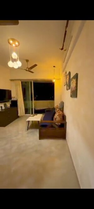 Living Room in 1 BHK Apartment at Tanvi Eminence, Mira Road – for Sale