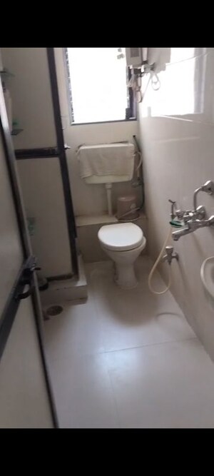 Bathroom in 1 BHK Apartment at Andheri CHS, Andheri West – for Rent