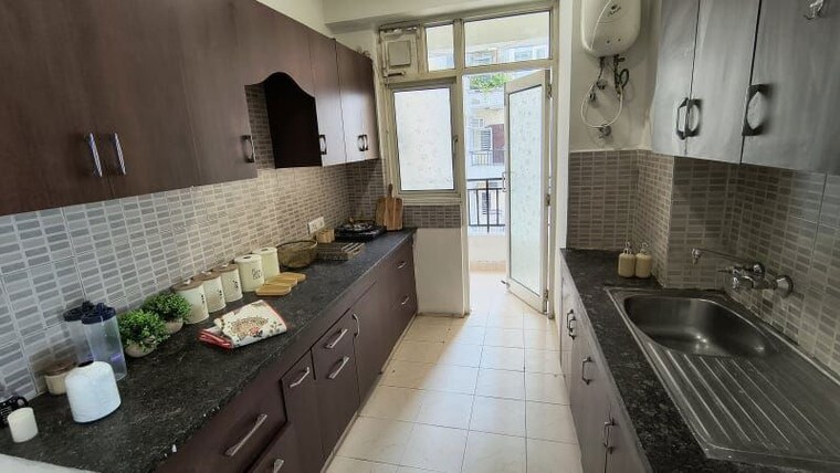 Kitchen, omaxe-palm-greens 3 Bedroom 1700 Sq.Ft. Apartment In Mu Greater Noida Greater Noida 10742048