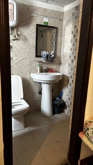 Bathroom in 2 BHK Apartment at Aims Golf Avenue I, Sector 75 – for Rent
