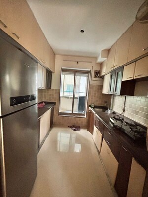 Kitchen in 2.5 BHK Apartment at Neelkanth Greens, Manpada – for Rent