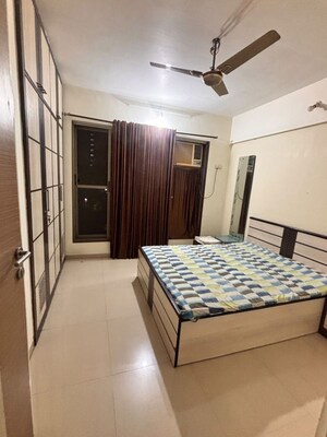 Bedroom in 2.5 BHK Apartment at Neelkanth Greens, Manpada – for Rent