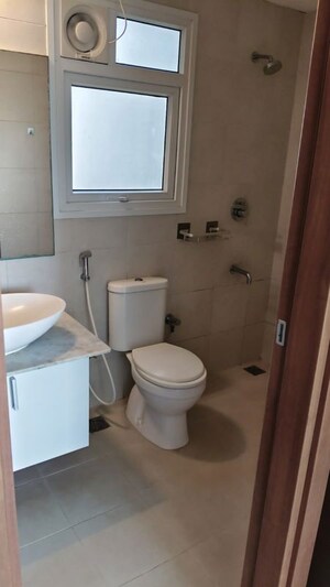 Bathroom in 3 BHK Apartment at Bhartiya City Nikoo Homes II, Thanisandra Main Road – for Rent
