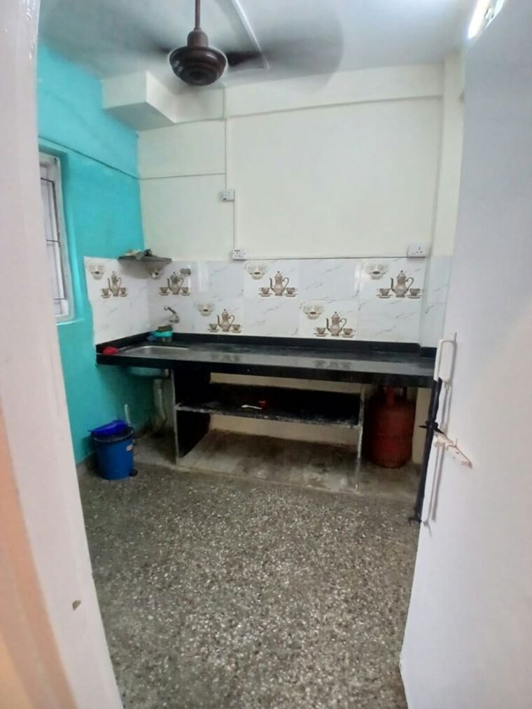 Kitchen, om-sai-palace-chs 1 Bedroom 560 Sq.Ft. Apartment In Mira Road East Thane 10742135