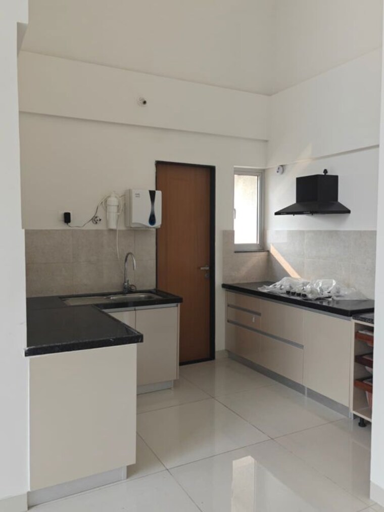 Kitchen, gera-planet-of-joy 2 Bedroom 800 Sq.Ft. Apartment In Kharadi Pune 10742138