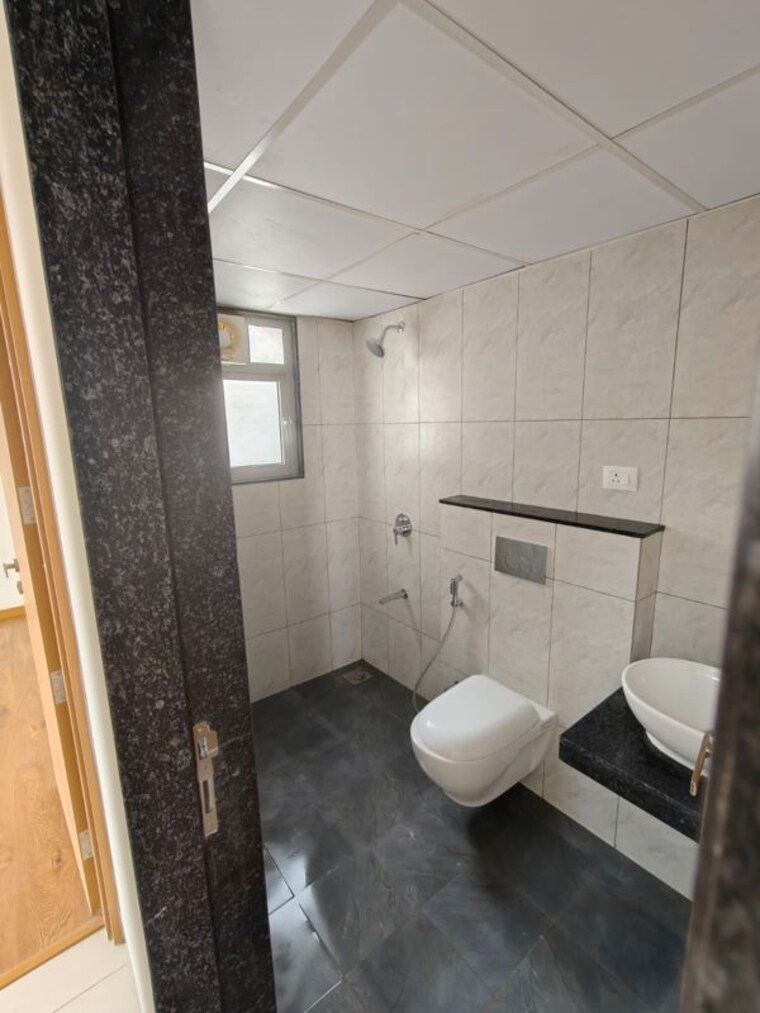 Bathroom, gera-planet-of-joy 2 Bedroom 800 Sq.Ft. Apartment In Kharadi Pune 10742138
