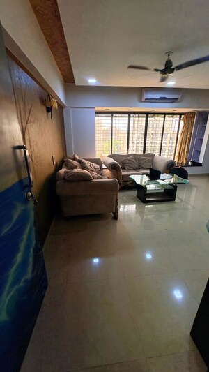 Living Room in 2 BHK Apartment at Millionaire Heritage, Andheri West – for Rent