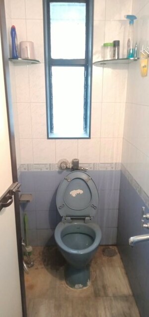 Bathroom in 1 BHK Apartment at Khodiyar Enclave CHS, Mira Road – for Rent