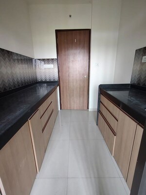 Kitchen in 2 BHK Apartment at Lodha Splendora River View, Ghodbunder Road – for Rent